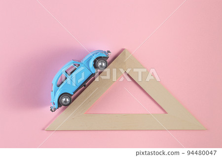 Izhevsk, Russia, February 15, 2020. vintage retro toy cars on a pink background Izhevsk, Russia, February 15, 2020. vintage retro toy cars on a pink background 94480047