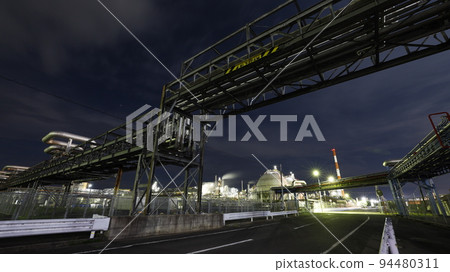 Night view of the pipeline bridge across the road and the Daicel Ohtake factory Night view of the pipeline bridge across the road and the Daicel Ohtake factory 94480311