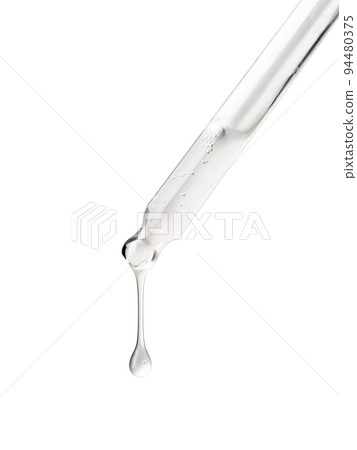 Clear essential serum oil dripping isolated Clear essential serum oil dripping isolated 94480375