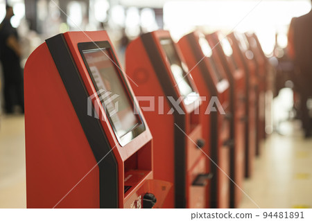 self check-in kiosk machine place at front airline counter in airport for passenger speed service fast and easy way self check-in kiosk machine place at front airline counter in airport for passenger speed service fast and easy way 94481891