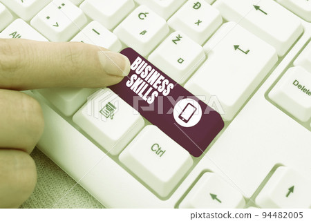 Hand writing sign Business SkillsAn ability to acquire systematic effort of job functions. Business approach An ability to acquire systematic effort of job functions 94482005