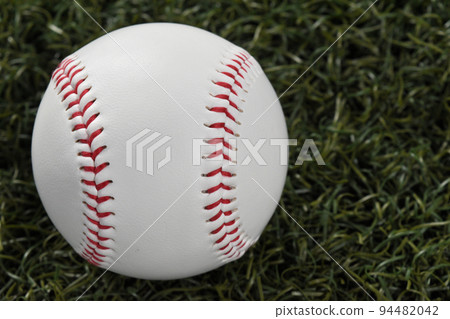 ball rolling on grass 94482042