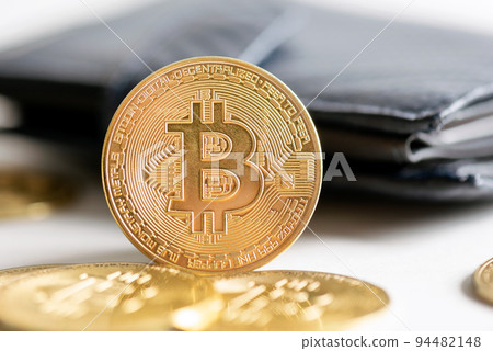 Cryptocurrency coins in wallet, Bitcoin, Ethereum Cryptocurrency coins in wallet, Bitcoin, Ethereum 94482148