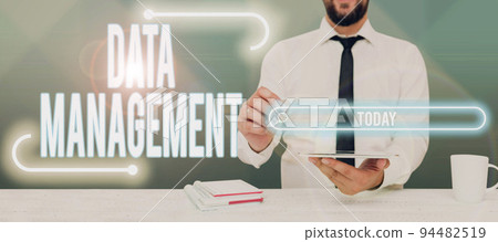 Conceptual caption Data ManagementThe practice of organizing and maintaining data processes. Conceptual photo The practice of organizing and maintaining data processes 94482519