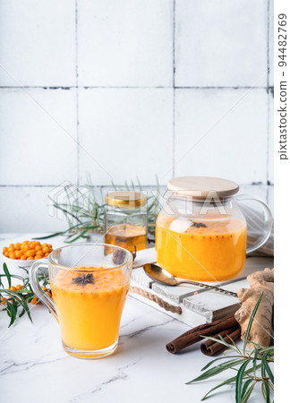 Homemade sea buckthorn tea with honey, ginger and spices 94482769