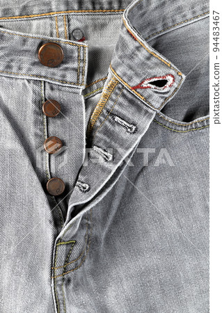 Close up Fashion Buttons on jeans, denim with seam of fashion design. Close up Fashion Buttons on jeans, denim with seam of fashion design. 94483467