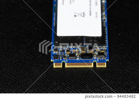 Solid state drives for computer - ssd sata, NVME PCIe, SATA SSD m key, b key isolated on dark background Solid state drives for computer - ssd sata, NVME PCIe, SATA SSD m key, b key isolated on dark background 94483482