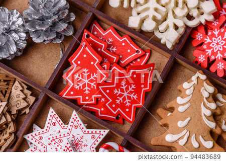 Christmas composition with gingerbread cookies, Christmas toys, pine cones and spices 94483689