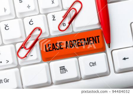 Handwriting text Lease AgreementContract on the terms to one party agrees rent property. Word Written on Contract on the terms to one party agrees rent property 94484032