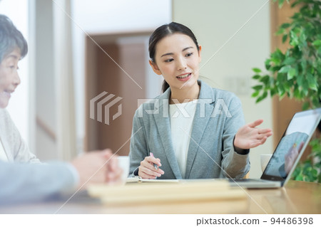 Senior woman consultation insurance 94486398