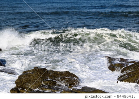 Rough waves of rocky place Shonai, Yamagata Prefecture Sea of Japan 94486413