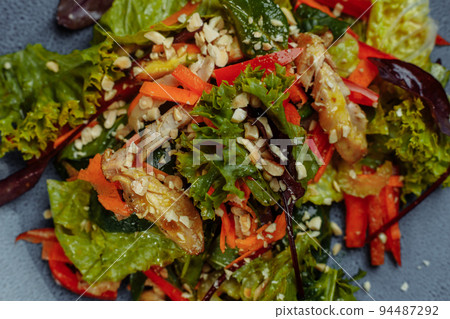 Healthy organic fresh salad with tomatoes, peppers and chicken Masala. Grilled chicken breasts and fresh vegetables in plate Healthy organic fresh salad with tomatoes, peppers and chicken Masala. Grilled chicken breasts and fresh vegetables in plate 94487292