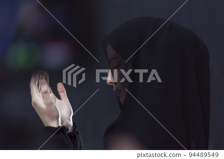 Portrait of young Muslim woman making dua Portrait of young Muslim woman making dua 94489549