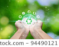 Hand holding with environment icons 94490121