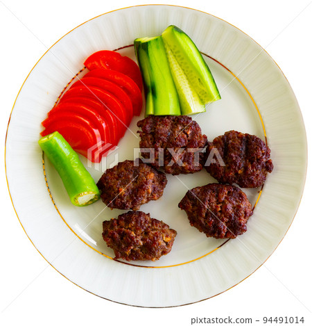 Turkish grilled meatballs, inegol kofte on plate Turkish grilled meatballs, inegol kofte on plate 94491014