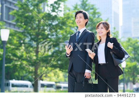 Business woman male smartphone team sales businessman Business woman male smartphone team sales businessman 94491273