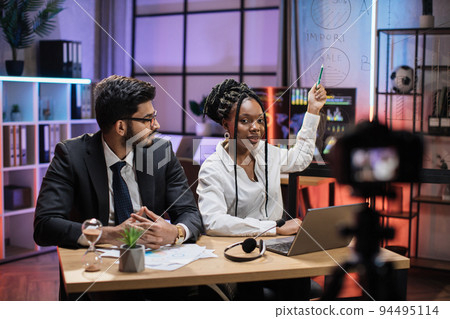 Male and female financiers, arab manager and confident african american business woman 94495114