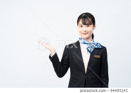 A woman in a suit with a blue scarf (guide) A woman in a suit with a blue scarf (guide) 94495241