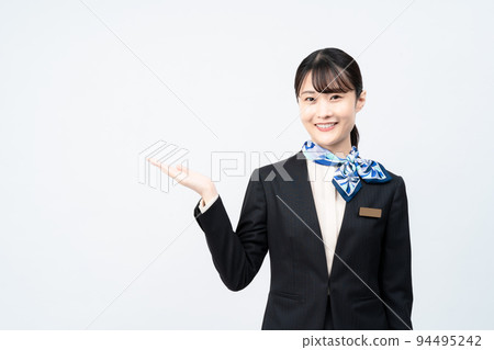A woman in a suit with a blue scarf (guide) A woman in a suit with a blue scarf (guide) 94495242