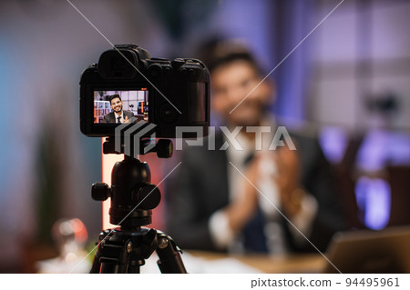 Focus on camera screen of smiling successful arab skilled bearded businessman 94495961