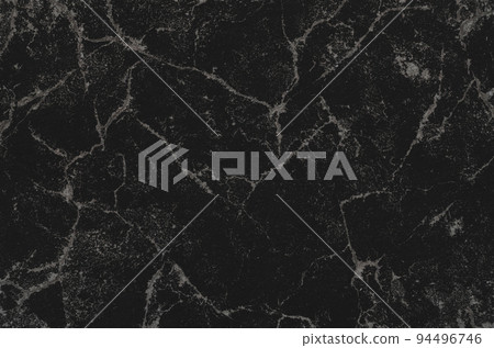 Grunge patterned background on black handmade paper texture 94496746