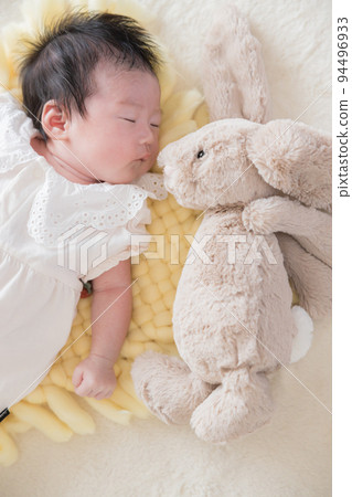 1 month old baby sleeping soundly 94496933
