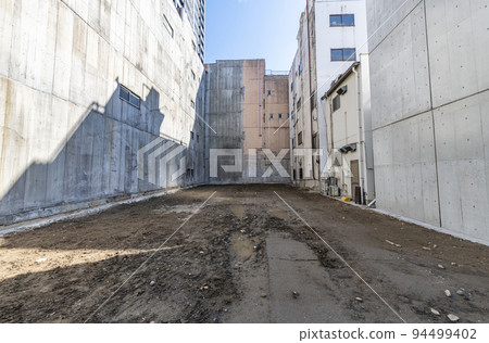 Urban land cleared after demolition Urban land cleared after demolition 94499402