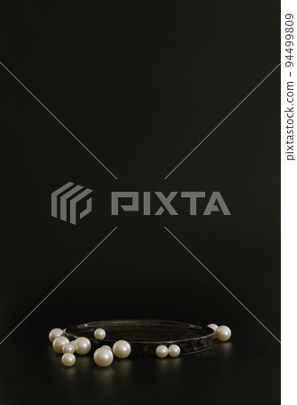 Black podium on the black background with pearls. Podium for product, cosmetic presentation. Creative mock up. Pedestal or platform for beauty products. 94499809