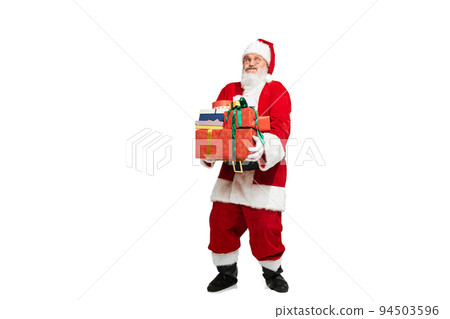 Portrait of senior man in image of Santa Claus with present box isolated over white background. Heavy gifts 94503596