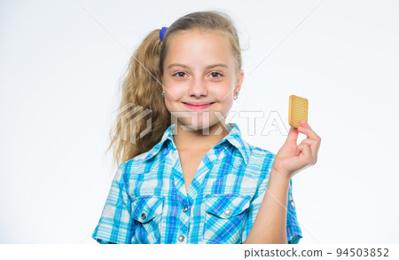 little girl with cookie. happy child eating cookies. little chef tasting cookie. healthy food and dieting. happy childhood. Dessert and pastry. The freshest cookies for you. Handmade cookies for sale 94503852