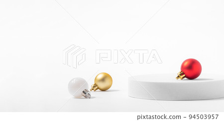 Cosmetic background for Christmas and winter holiday. White podium and christmas balls on white background. Cosmetic background for Christmas and winter holiday. White podium and christmas balls on white background. 94503957
