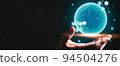 Businessman hand holding blue glowing earth hologram with copy space black background. Business and technology concept. Modern tech and metaverse theme. People and futuristic worldwide innovation 94504276