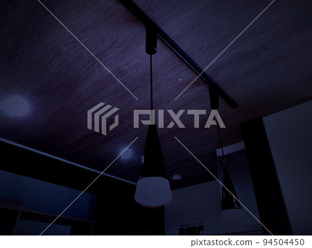 Image of ceiling lighting in a dimly lit place Image of ceiling lighting in a dimly lit place 94504450