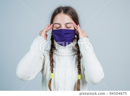 teen girl wear respirator mask while coronavirus pandemic quarantine, symptom 94504675