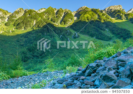 The ridgeline to Mt. Nishihotaka looking up from Dakesawa in the Hotaka mountain range of the Northern Alps The ridgeline to Mt. Nishihotaka looking up from Dakesawa in the Hotaka mountain range of the Northern Alps 94507850