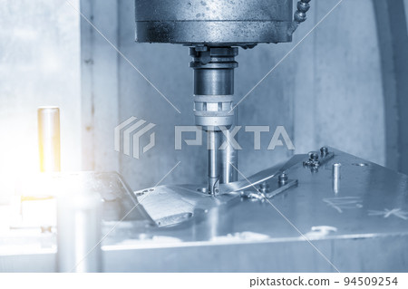 Close up scene the CNC milling machine rough cutting the injection mold parts by indexable tools. 94509254