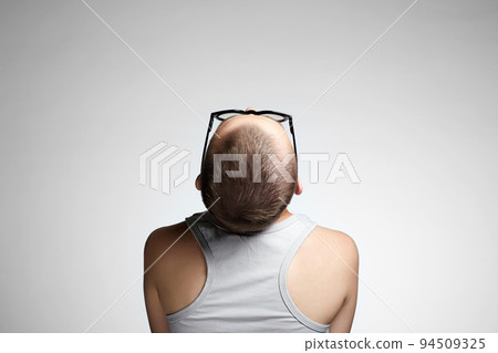 beautiful Girl with short haircut. Back of bald woman in Glasses 94509325