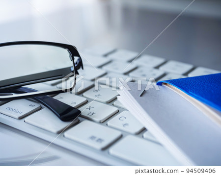 Documents, notebook, glasses, personal computer business image Documents, notebook, glasses, personal computer business image 94509406