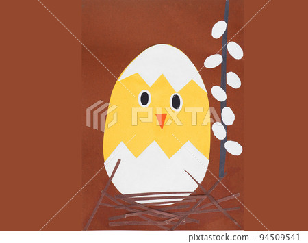 Handmade yellow applique chicken in egg shell and pussy willow on brown paper 94509541