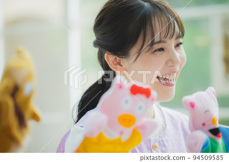 Nursery teacher male and female 94509585