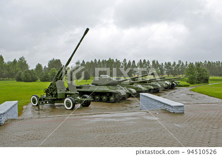 A platform with military equipment - artillery pieces and tanks. Memorial complex "Buinichskoe Pole". Buynichi. Mogilev region. Belarus 94510526