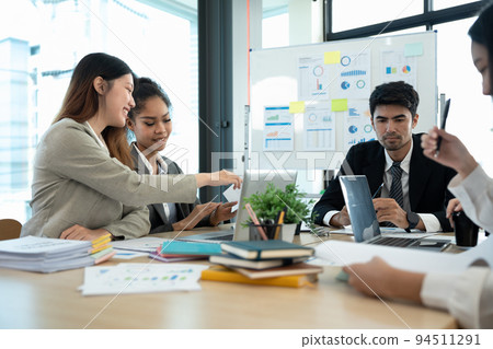diverse business team people and female leader boss discuss financial result review paperwork share ideas brainstorm collaborate work in teamwork at group briefing table diverse business team people and female leader boss discuss financial result review paperwork share ideas brainstorm collaborate work in teamwork at group briefing table 94511291