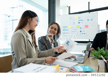 Diversity business people meeting for analysis data figures to plan business strategies. Business discussing concept 94511292