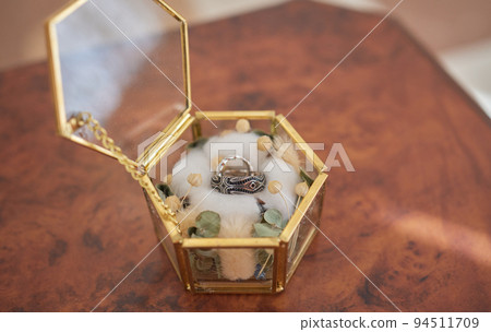 Wedding day, two rings on the small decorative pillow. Wedding day, two rings on the small decorative pillow. 94511709