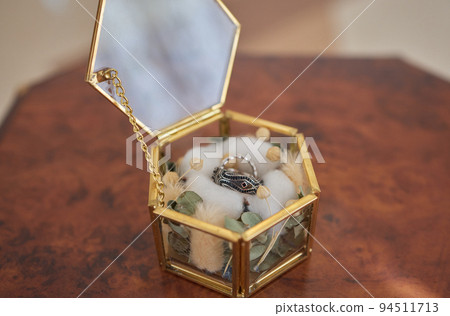 Wedding day, two rings on the small decorative pillow. 94511713