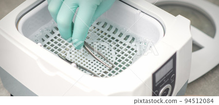 Hand disinfects tweezers with cleaning systems for medical instruments. Ultrasonic cleaner 94512084