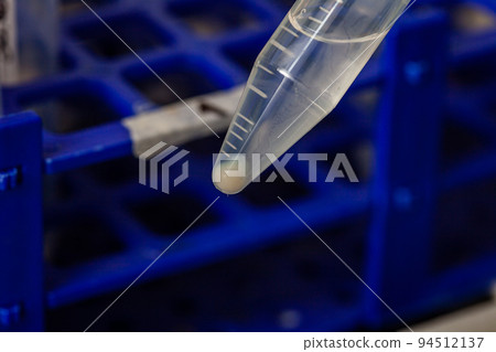 Test tube with blood cells pellet obtained after several washes and centrifugation. 94512137