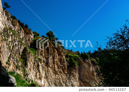 Stones on the slopes of the Avakas mountain gorge on the island of Cyprus. Stones on the slopes of the Avakas mountain gorge on the island of Cyprus. 94513287