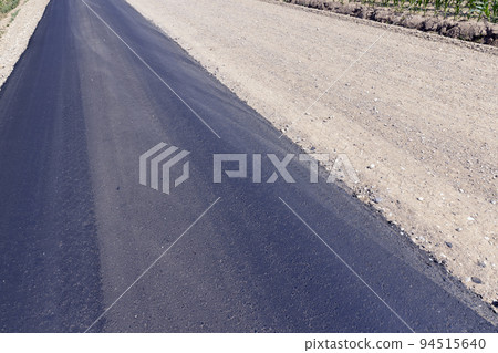 paved road for car traffic 94515640