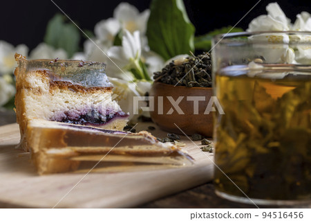 A real green hour with jasmine on the table 94516456